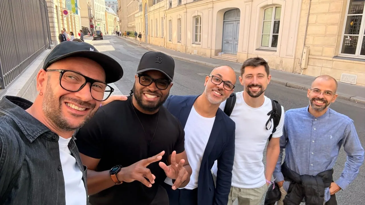 Five of us on a sunny street in Paris on the way to the conference